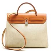 Pre-owned Leather handbags Hermès Vintage , Beige , Dames