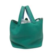 Pre-owned Leather handbags Hermès Vintage , Green , Dames