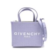 Pre-owned Canvas handbags Givenchy Pre-owned , Purple , Dames