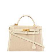 Pre-owned Canvas handbags Hermès Vintage , Beige , Dames