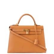 Pre-owned Canvas handbags Hermès Vintage , Yellow , Dames