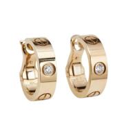 Pre-owned Metal earrings Cartier Vintage , Yellow , Dames