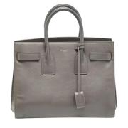 Pre-owned Leather handbags Yves Saint Laurent Vintage , Gray , Dames