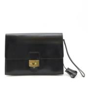 Pre-owned Leather clutches Hermès Vintage , Black , Dames