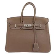 Pre-owned Leather handbags Hermès Vintage , Brown , Dames