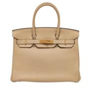 Pre-owned Leather totes Hermès Vintage , Beige , Dames