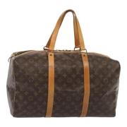 Pre-owned Canvas handbags Louis Vuitton Vintage , Brown , Dames