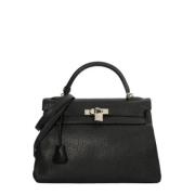 Pre-owned Leather handbags Hermès Vintage , Black , Dames