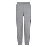 Grijze elastische broek met geribbelde onderkant Stone Island , Gray ,...