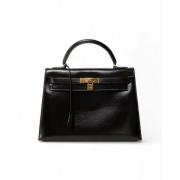 Pre-owned Leather handbags Hermès Vintage , Black , Dames