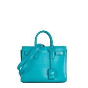 Pre-owned Leather handbags Yves Saint Laurent Vintage , Blue , Dames