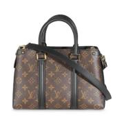 Pre-owned Canvas handbags Louis Vuitton Vintage , Black , Dames