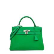 Pre-owned Leather handbags Hermès Vintage , Green , Dames