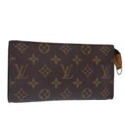 Pre-owned Canvas pouches Louis Vuitton Vintage , Brown , Dames