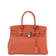 Pre-owned Canvas handbags Hermès Vintage , Orange , Dames