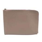 Pre-owned Leather clutches Louis Vuitton Vintage , Beige , Dames