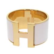 Pre-owned Metal bracelets Hermès Vintage , Yellow , Dames