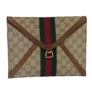 Pre-owned Canvas clutches Gucci Vintage , Beige , Dames