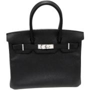 Pre-owned Leather handbags Hermès Vintage , Black , Dames