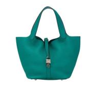 Pre-owned Leather handbags Hermès Vintage , Green , Dames