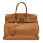 Pre-owned Leather handbags Hermès Vintage , Brown , Dames