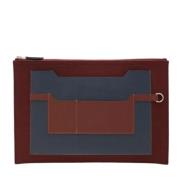 Pre-owned Canvas clutches Hermès Vintage , Brown , Dames