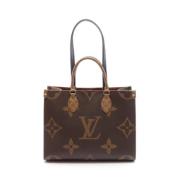 Pre-owned Leather handbags Louis Vuitton Vintage , Beige , Dames