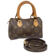 Pre-owned Fabric handbags Louis Vuitton Vintage , Brown , Dames