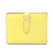 Pre-owned Leather wallets Hermès Vintage , Yellow , Dames