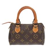 Pre-owned Canvas handbags Louis Vuitton Vintage , Brown , Dames