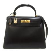 Pre-owned Leather handbags Hermès Vintage , Black , Dames