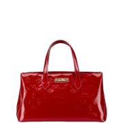 Pre-owned Leather handbags Louis Vuitton Vintage , Red , Dames