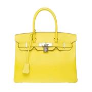 Pre-owned Leather handbags Hermès Vintage , Yellow , Dames