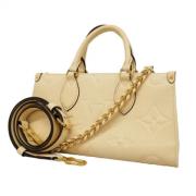 Pre-owned Fabric handbags Louis Vuitton Vintage , Beige , Dames