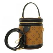 Pre-owned Fabric handbags Louis Vuitton Vintage , Brown , Dames