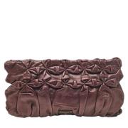 Pre-owned Leather clutches Prada Vintage , Purple , Dames