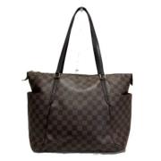 Pre-owned Canvas handbags Louis Vuitton Vintage , Brown , Dames