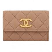 Pre-owned Leather wallets Chanel Vintage , Beige , Dames