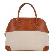 Pre-owned Leather handbags Hermès Vintage , Beige , Dames