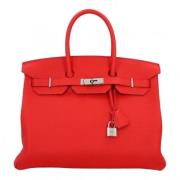 Pre-owned Leather handbags Hermès Vintage , Red , Dames