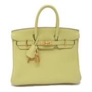 Pre-owned Leather handbags Hermès Vintage , Yellow , Dames