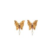 Pre-owned Metal earrings Yves Saint Laurent Vintage , Yellow , Dames