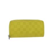 Pre-owned Leather wallets Louis Vuitton Vintage , Yellow , Dames