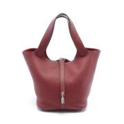 Pre-owned Leather handbags Hermès Vintage , Red , Dames