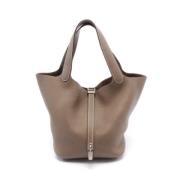 Pre-owned Leather handbags Hermès Vintage , Gray , Dames