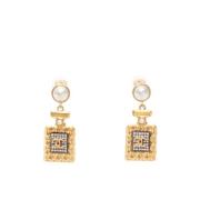 Pre-owned Metal earrings Chanel Vintage , Yellow , Dames