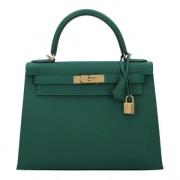 Pre-owned Leather handbags Hermès Vintage , Green , Dames