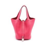 Pre-owned Leather handbags Hermès Vintage , Pink , Dames