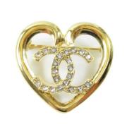 Pre-owned Metal brooches Chanel Vintage , Yellow , Dames