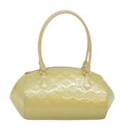 Pre-owned Leather handbags Louis Vuitton Vintage , Beige , Dames